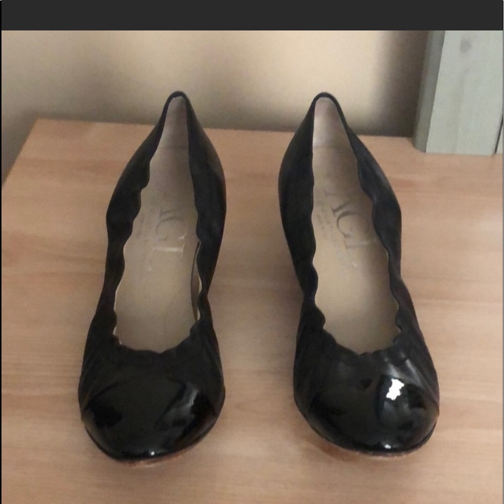 AGL black flats with leopard print wedge